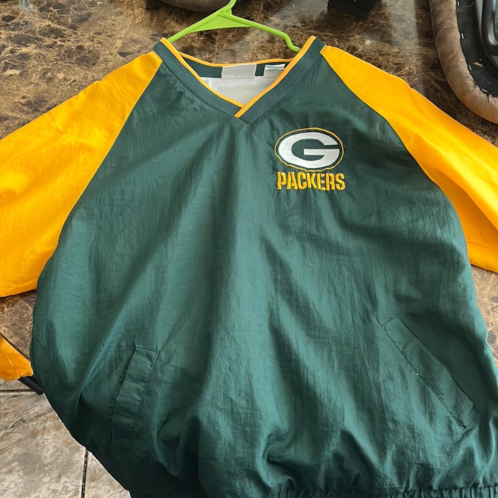 An NFL kids Touchdown club Green Bay Packers jacket size 18 XL